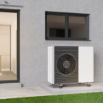 Air heat pump standing outdoors.